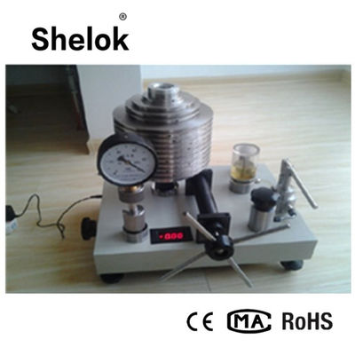 Pressure gauge dead weight tester